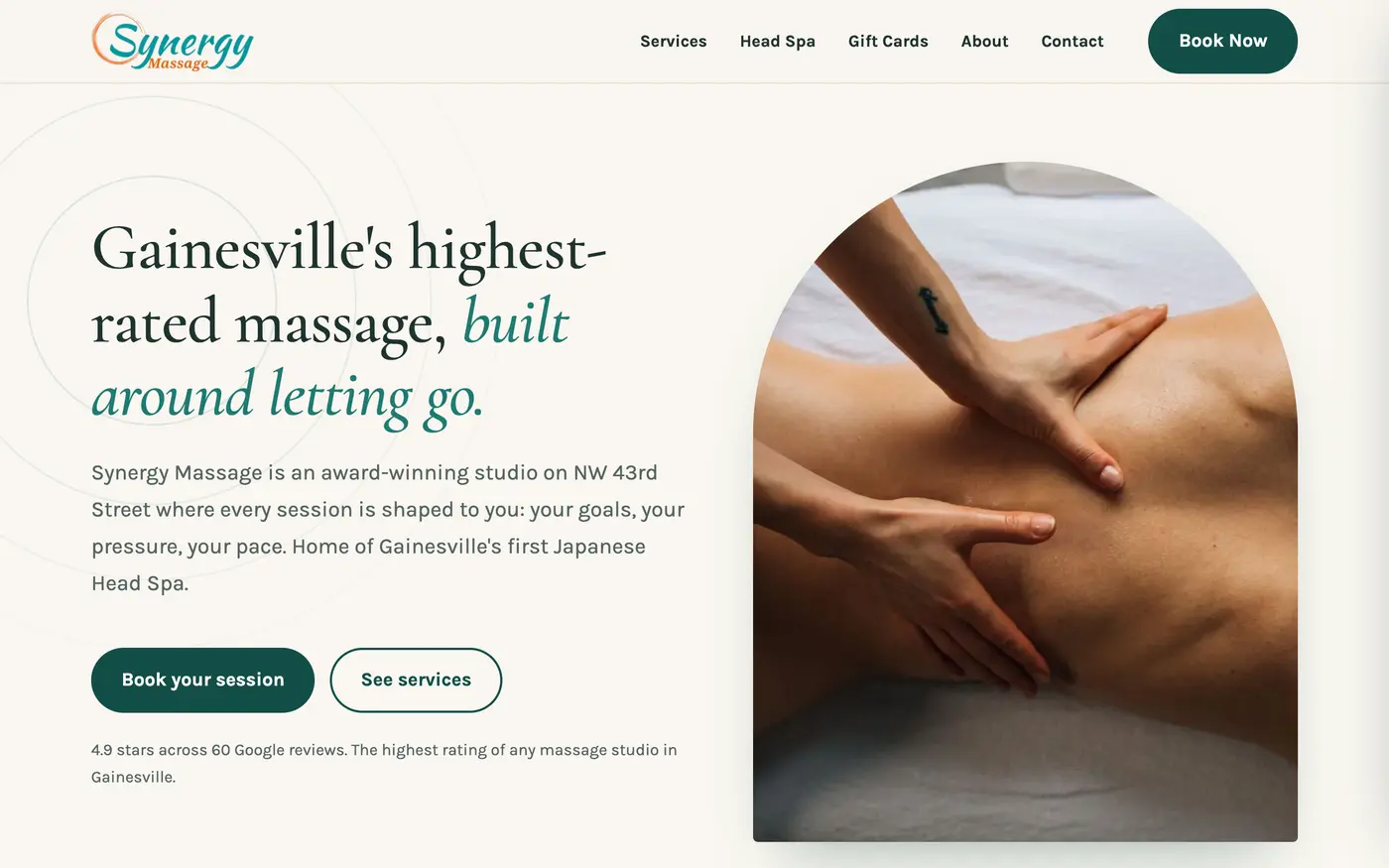 Preview of the classic website: cream background, teal accents, photo of a massage in an arched frame